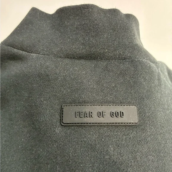 This is a Fear of God Essentials black sweatshirt. - Picture 7 of 7